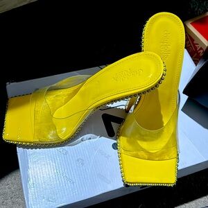 Yellow heels from Charlotte Russe ,size 8.Only wore them one time